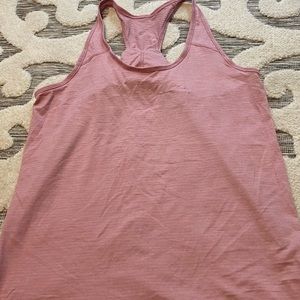 Bundle of 4. Lululemon EUC and GUC Size 10 Tanks. Check out all my Lulu!
